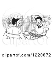 Black And White Happy Retro Couple Dining In A City Restaurant
