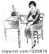 Black And White Retro Woman Reading At A Desk