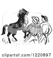 Clipart Of Cowboys Training A Horse Royalty Free Vector Illustration