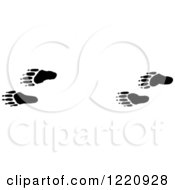 Clipart Of Black And White Raccoon Tracks Royalty Free Vector Illustration by Picsburg