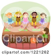Diverse Children Performing A Play As Bees And Flowers