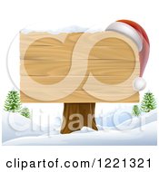 Poster, Art Print Of Wooden Christmas Sign With A Santa Hat In A Winter Landscape