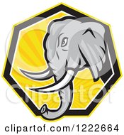 Clipart Of A Gray Elephant Head Over A Hexagon Of Yellow Rays Royalty Free Vector Illustration