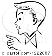 Clipart Of A Pointing Retro Boy In Profile In Black And White Royalty Free Vector Illustration