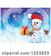 Clipart Of A Happy Snowman Holding A Christmas Present Over Snow Royalty Free Vector Illustration by visekart