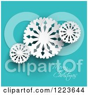 Clipart Of A Merry Christmas Greeting With Paper Snowflakes On Turquoise Royalty Free Vector Illustration