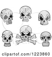 Clipart Of Grayscale Monster Skulls Royalty Free Vector Illustration