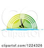 Silhouetted Windsurfer Over A Green Half Circle