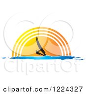 Poster, Art Print Of Silhouetted Windsurfer Against A Sunset