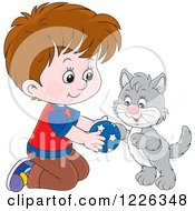 Poster, Art Print Of Caucasian Boy Kneeling And Playing With A Kitten