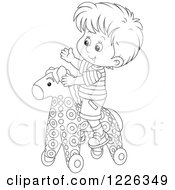 Clipart Of An Outlined Boy Playing On A Rolling Toy Horse Royalty Free Vector Illustration