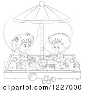 Outlined Girl And Boy Playing In A Sand Box