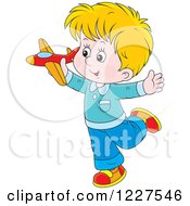 Caucasian Boy Playing With A Toy Plane