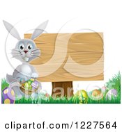 Gray Bunny By A Wood Sign And Easter Eggs