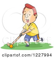 Man Playing Field Hockey