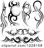 Clipart Of Black And White Tribal Tattoo Designs 2 Royalty Free Vector Illustration
