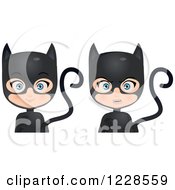 Clipart Of A Happy Girl In Black Cat Costumes Royalty Free Vector Illustration