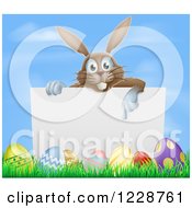 Poster, Art Print Of Brown Easter Bunny Pointing Down At A Sign Over Eggs Against Sky