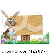 Poster, Art Print Of Brown Easter Bunny By A Wood Sign With Eggs And A Basket