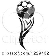 Clipart Of A Black And White Flying Soccer Ball 5 Royalty Free Vector Illustration