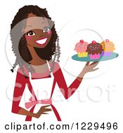 Clipart Of A Happy Black Baker Woman Holding A Tray Of Cupcakes Royalty Free Vector Illustration by peachidesigns #COLLC1229496-0137
