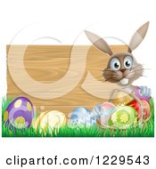 Poster, Art Print Of Brown Bunny By A Wood Sign With Grass And Easter Eggs