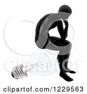 Clipart Of A Silhouetted Man Sitting And Thinking On A Light Bulb Royalty Free Vector Illustration