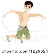Teenage Boy Jumping In Swim Trunks