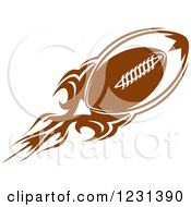Clipart Of A Brown Flying American Football With Flames Royalty Free Vector Illustration