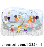Happy Mother And Children Around A Water Fountain
