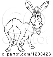 Clipart Of A Black And White Donkey Looking Back And Grinning Royalty Free Vector Illustration