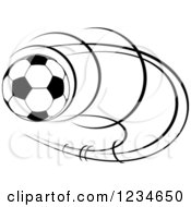Clipart Of A Black And White Flying Soccer Ball 7 Royalty Free Vector Illustration