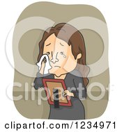Poster, Art Print Of Caucasian Woman Crying And Looking At A Picture Of A Deceased Loved One