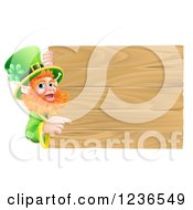 Poster, Art Print Of St Patricks Day Leprechaun Pointing To A Wooden Sign