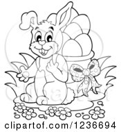 Clipart Of A Black And White Bunny Carrying A Basket Of Easter Eggs On His Back Royalty Free Vector Illustration