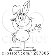 Clipart Of A Black And White Happy Rabbit Waving Royalty Free Vector Illustration
