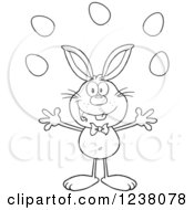 Poster, Art Print Of Black And White Rabbit Juggling Easter Eggs