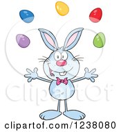 Clipart Of A Blue Rabbit Juggling Easter Eggs Royalty Free Vector Illustration