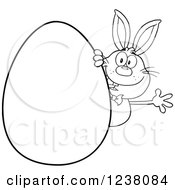 Poster, Art Print Of Black And White Rabbit Waving Around A Giant Easter Egg