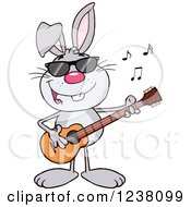 Clipart Of A Gray Rabbit Playing A Guitar Royalty Free Vector Illustration