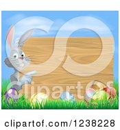Poster, Art Print Of Wood Sign Easter Bunny With Eggs Grass And Sky