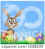 Poster, Art Print Of Brown Easter Bunny With A Basket And Eggs In Grass Over Sky