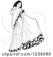 Black And White Beautiful Indian Woman Modeling A Saree Dress