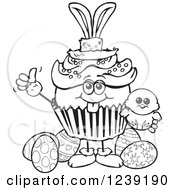 Clipart Of A Black And White Easter Bunny Cupcake With A Chick And Eggs Royalty Free Vector Illustration