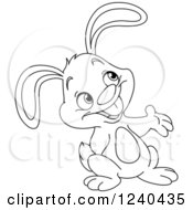 Clipart Of A Black And White Bunny Presenting Royalty Free Vector Illustration