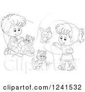 Clipart Of A Black And White Boy And Girl Playing With Kittens And Yarn Royalty Free Vector Illustration