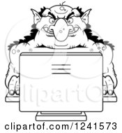 Black And White Troll Using A Computer