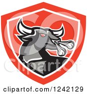 Clipart Of A Mad Raging Bull In A Red Shield Royalty Free Vector Illustration