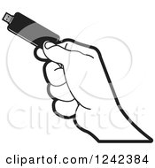 Clipart Of A Black And White Hand Holding A Usb Flash Drive Royalty Free Vector Illustration
