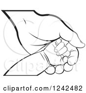 Poster, Art Print Of Blcak And White Baby Hand On A Mothers Or Grandparents Hand